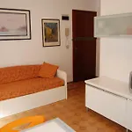 Apartamento Villaggio Olimpia